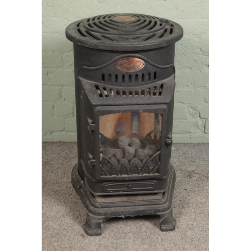 335 - A Provence cast iron gas stove. Height 80cm, diameter 50cm.