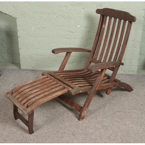 346 - A teak and brass Paul Reef garden patio lounger.