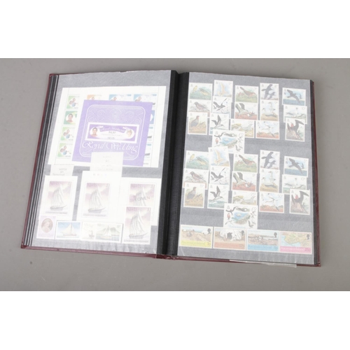 74 - An album of unmounted mint stamps from around the world many with full sets