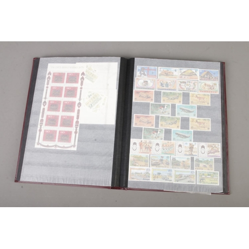 74 - An album of unmounted mint stamps from around the world many with full sets