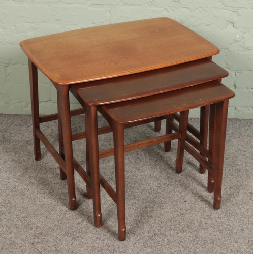 514 - A mid 20th century nest of three tables by Remploy.