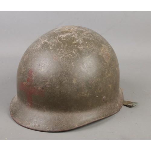 156 - A military steel helmet, possibly American M1.