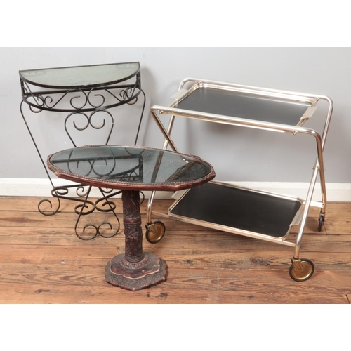 524 - A folding trolley with small garden console table and oriental style occasional table