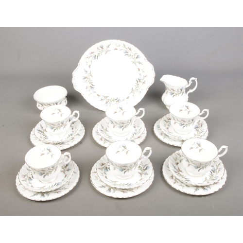 79 - A Royal Albert part tea service in the Brigadoon pattern to include milk jug, sugar bowl, cake plate... 