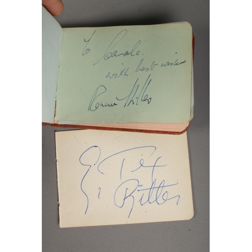 29 - A vintage autograph album containing a collection of signatures, including examples for singers Dick... 