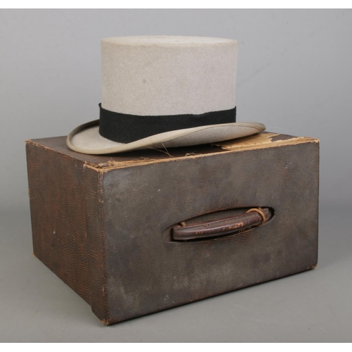 43 - A Moss Bros grey top hat, housed in Dunn & Co box, bearing Cole Brothers label.