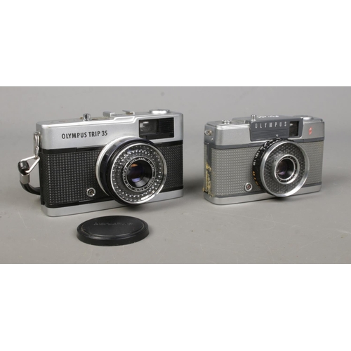 69 - An Olympus Trip 35 camera, with f=40mm lens, lens cap and branded case, together with an Olympus PEN... 