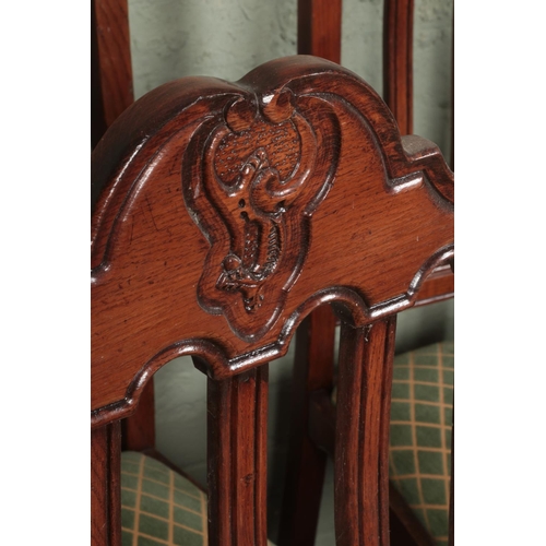 533 - A set of ten oak dining chairs, containing two carvers. Featuring carved detailing to top of backres... 