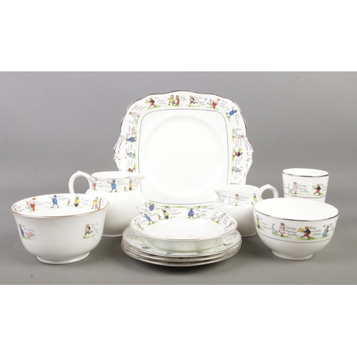 87 - A Paragon/Bridgwood Nursery Rhyme part tea service including milk and cream jugs,  sugar bowl, side ... 