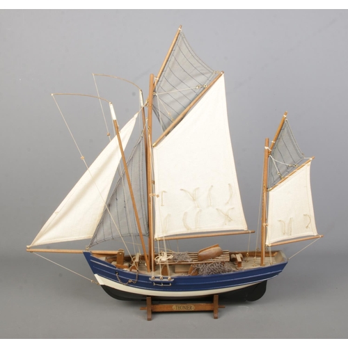 103 - A display model of a Thonier: French Tuna fishing boat featuring cloth sails, rigging and stand with... 