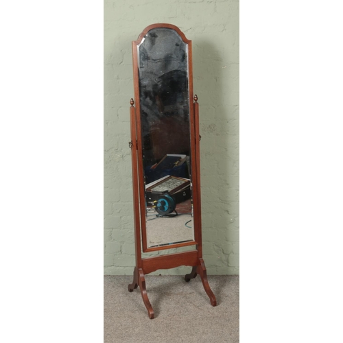 545 - A mahogany cheval mirror. Approx. height 157cm.