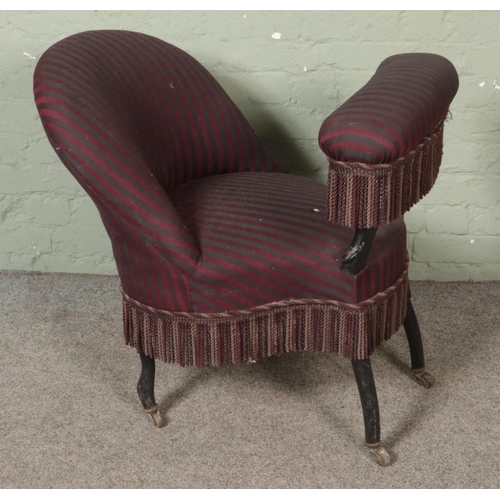 554 - A rare Victorian upholstered chair of unusual bespoke form, possible voyeur cockfighting chair or pr... 