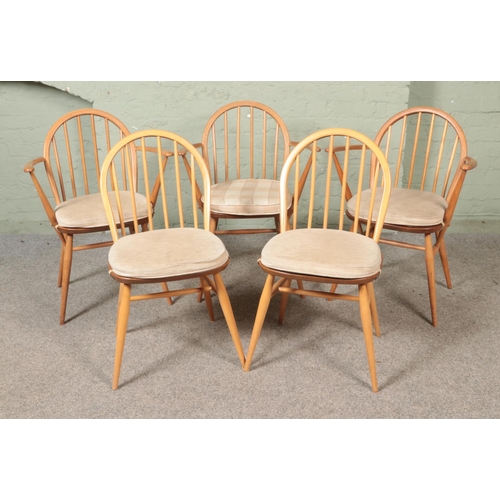 558 - A harlequin set of five dining chairs, to include three Ercol Windsor elbow examples; model 370, for... 