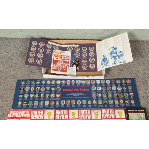 122 - A collection of vintage sports memorabilia, to include Esso Football Club badges, Top Team Collectio... 