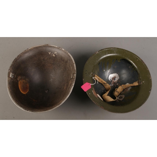 127 - Two British military helmets including a Mk2 and Mk4 example