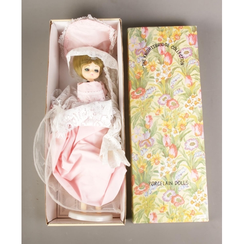 134 - A boxed Knightsbridge Collection porcelain doll with certificate of authenticity