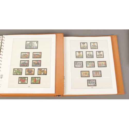 41 - Three empty Linder Great British stamp albums, with pre-printed pages for between 1983-2001.