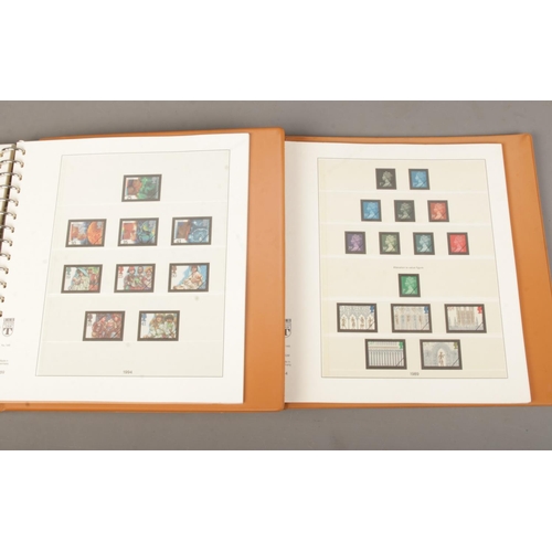 41 - Three empty Linder Great British stamp albums, with pre-printed pages for between 1983-2001.