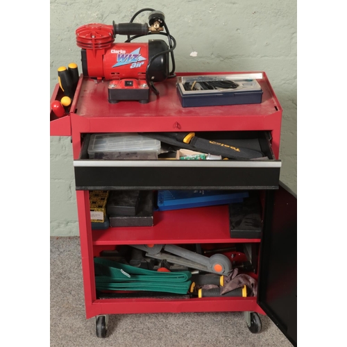 335 - A red and black tool cabinet on casters with contents of assorted tools to include Clarke Wiz Air ta... 