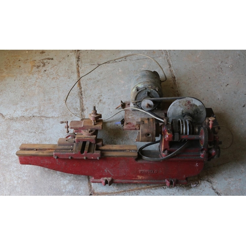 345 - A vintage Winfield metal working lathe.