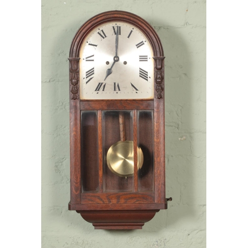 348 - A H.A.C (Hamberg American Clock Co) wall clock with roman numeral dial.