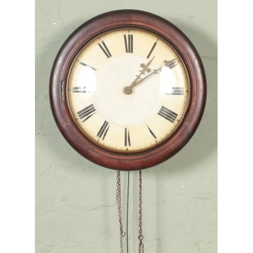 349 - A mahogany postman's alarm clock with roman numeral dial with pendulum.