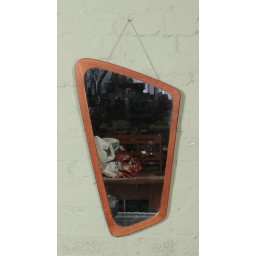 372 - Clark Eaton teak framed asymmetrical mirror. Approx. dimensions 64cm x 37cm.