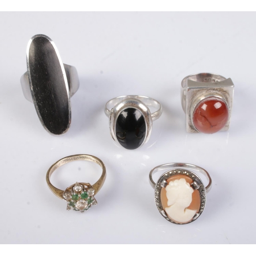 416 - A collection mostly silver rings to include polished gemstone, cluster and cameo examples.