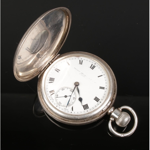 425 - A silver half hunter pocket watch assayed Birmingham 1920 Dennison Watch Case Co. Face having faded ... 