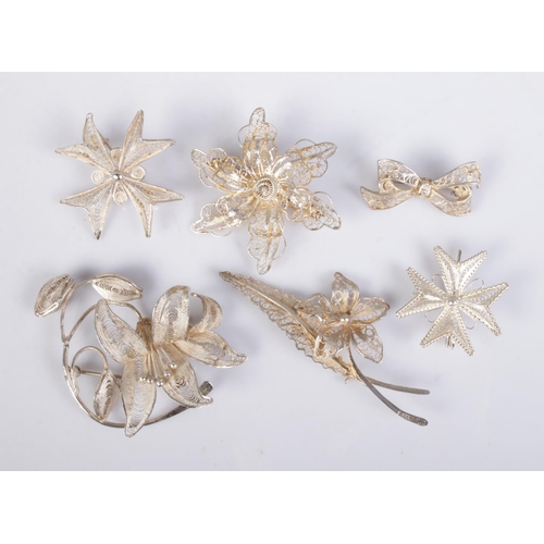 447 - Six filigree brooches to include four silver examples, most with a floral design. Approx. silver wei... 