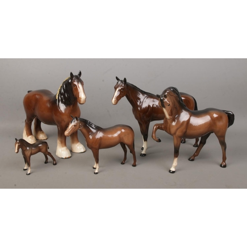 465 - Four Beswick ceramic horses, together with a similar Royal Doulton example. Includes large Shire Hor... 