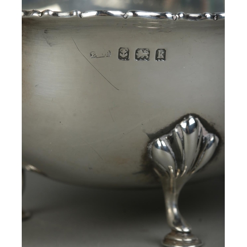 472 - An Edwardian silver sauceboat, with beaded rim raised on three hoofed feet. Assayed for Birmingham, ... 