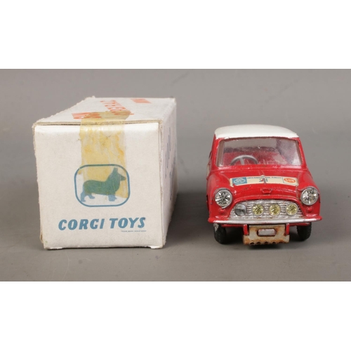 485 - A Corgi BMC Mini Cooper S, from '1000 Winners', in red with contrasting white roof. In white carded ... 