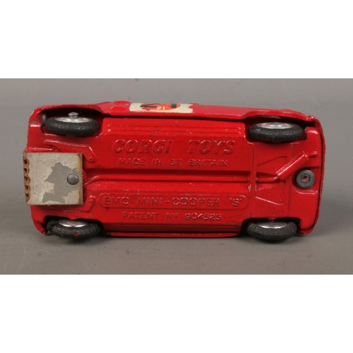 485 - A Corgi BMC Mini Cooper S, from '1000 Winners', in red with contrasting white roof. In white carded ... 