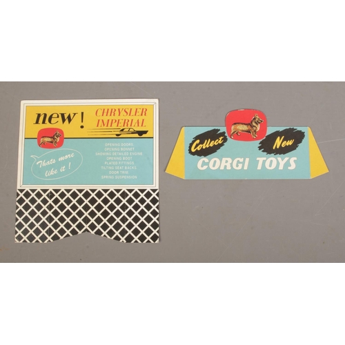 487 - Two cardboard Corgi Toys promotional advertising signs; 'Thats more like it! New Chrysler Imperial' ... 