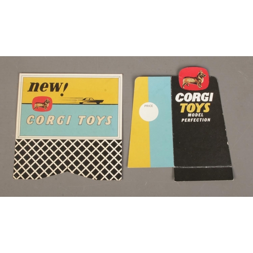 488 - Two cardboard Corgi Toys promotional advertising signs; 'Model Perfection' and 'New! Corgi Toys'.