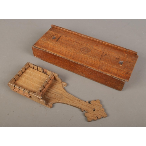 494 - An antique ecclesiastical communion bread cutting board and dispenser, used for cutting unleavened b... 