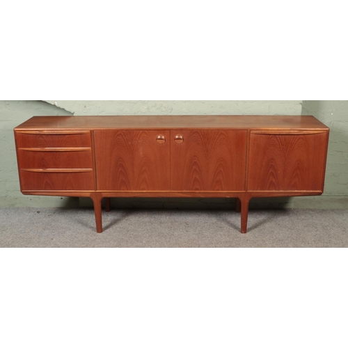 508 - An A H McIntosh & Company teak sideboard, with arrangement of three drawers, two central cupboard do... 