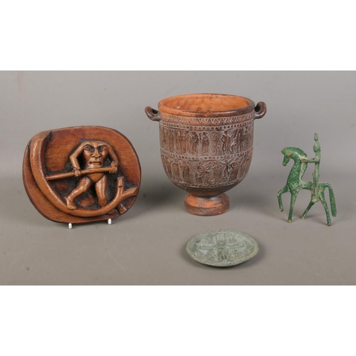 138 - Four items after antiquity. Includes Greek vessel, faux carving Mr Somebody Blemmyae, Verdi Gris fig... 