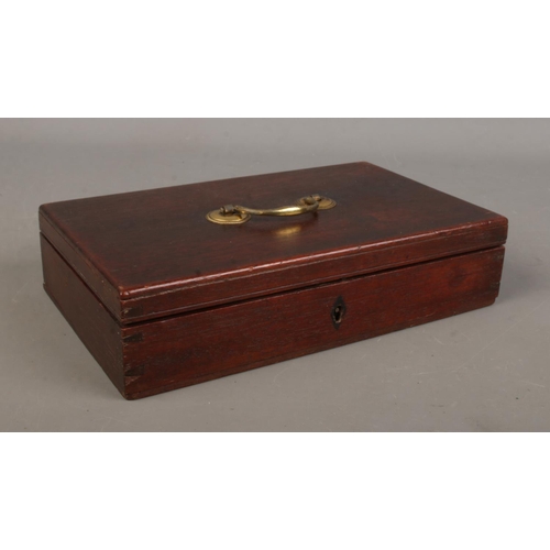 71 - A late 19th/early 20th century mahogany pistol box. Height 6cm, Width 25cm, Depth 15cm.