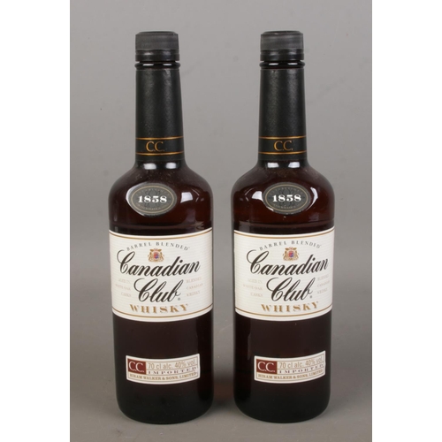 73 - Two full and sealed bottles of Canadian Club blended whisky. Both 70cl.