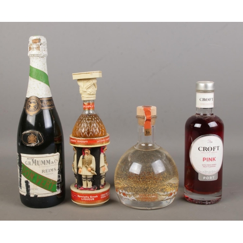 74 - Four full and sealed bottles of alcohol. Includes Croft Pink Port, Infusionist Gold Flake Clementine... 