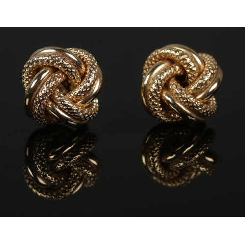 428 - A pair of 9ct Gold knot earrings. Total weight: 1.5g