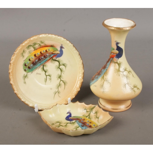 499 - Three pieces of Locke & Co Worcester; vase, saucer and trinket dish. All hand painted decorated with... 