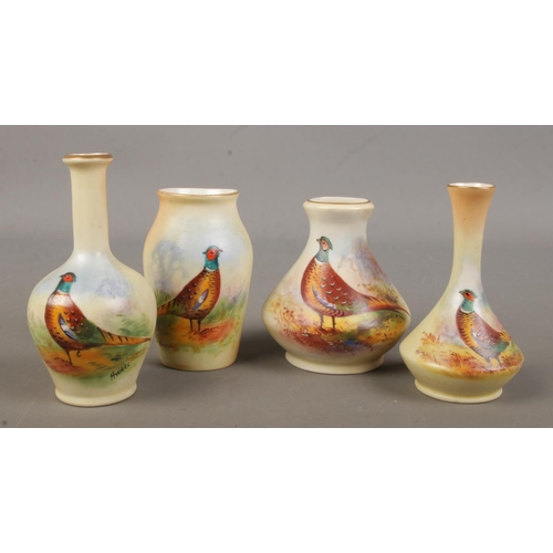 503 - Four small Locke & Co Worcester vases. All hand painted and decorated with a pheasant. Signed H Wall... 