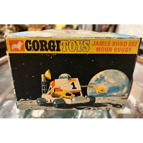 486 - A boxed Corgi 811 diecast model: James Bond 007 'Diamonds are Forever' Moon Buggy with seated James ... 