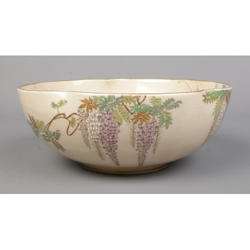 1 - A Japanese Kinkozan bowl decorated with Wisteria. Signed to base. Height 8cm, Diameter 21cm.