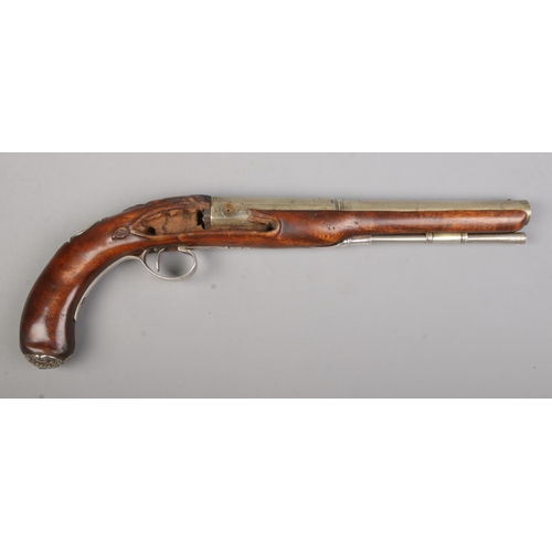 101 - A 19th century flintlock pistol, marked for Mackingtosh London. Having white metal barrel, trigger a... 