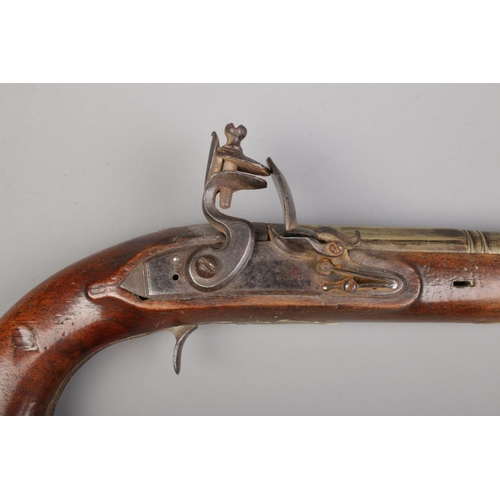 102 - A 19th century flint lock pistol. The lock plate stamped for William Bond. Total length 33cm. CANNOT... 