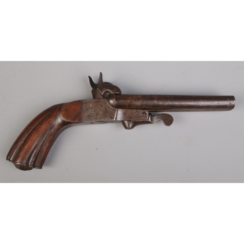 109 - A 19th century double barrel percussion pistol. Length 24.5cm. CANNOT POST OVERSEAS.